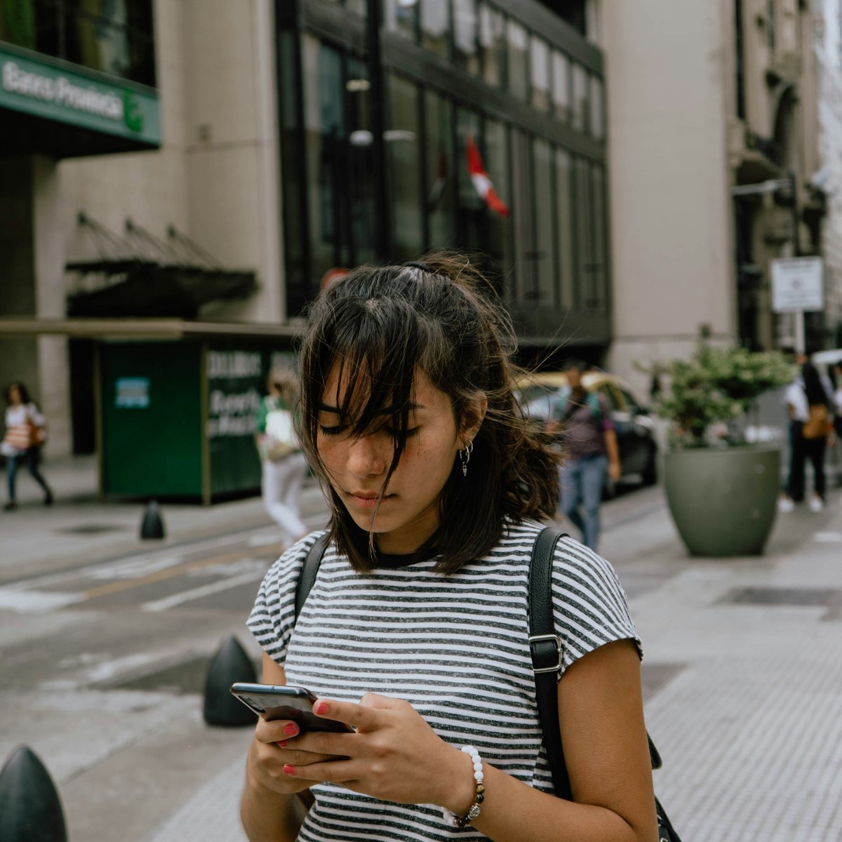 Person checking Crystal Clear App on their phone