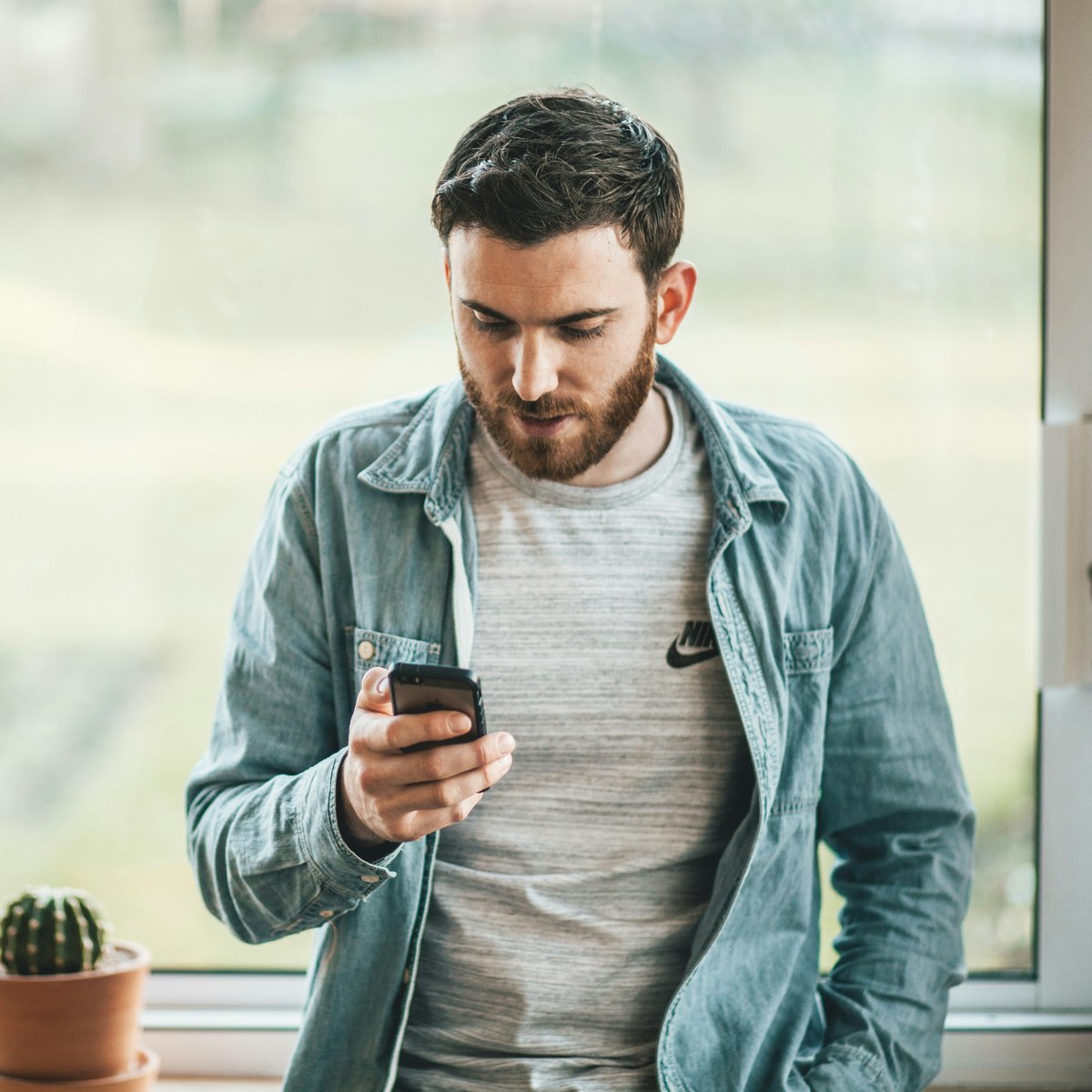 Person checking Crystal Clear App on their phone